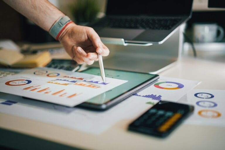 Planning a digital marketing budget for startups with charts and expense calculations