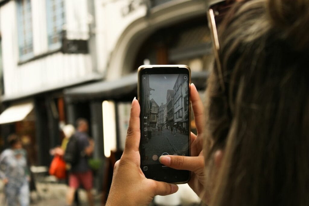 Customer using a phone to find nearby businesses - how to rank on Google Maps in Vasai Virar